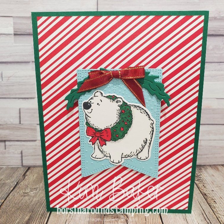 polar bear with wreath around his neck on front of card