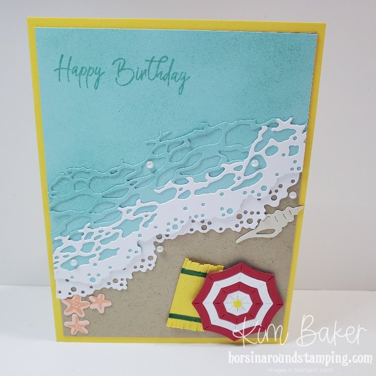 Rolling waves card front with beach umbrella and towel