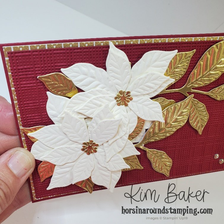 vanilla and gold poinsettias on the front of a slimline card